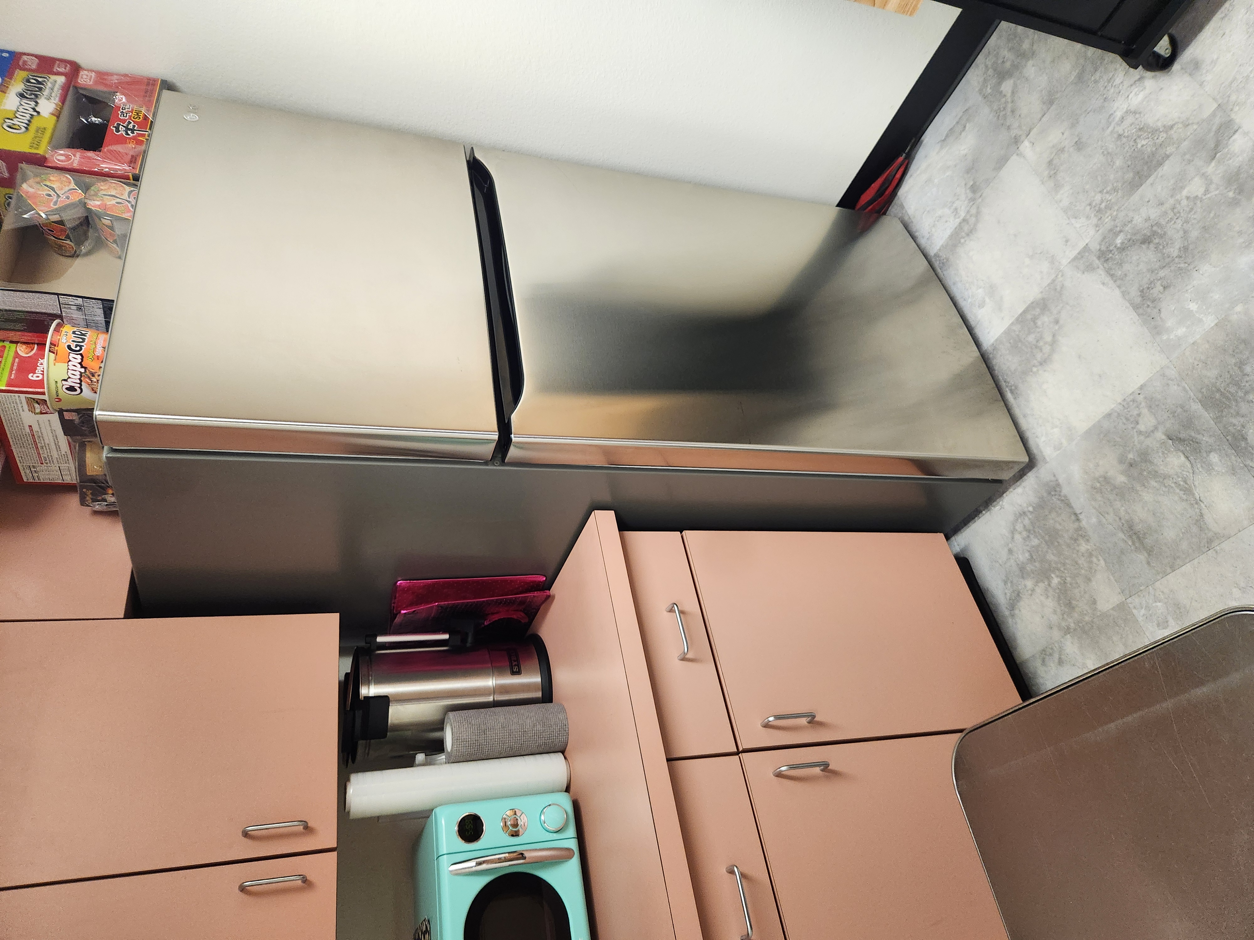 Office kitchenette fridge area cleaned